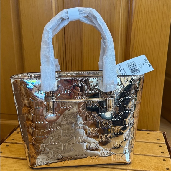 Michael Kors Metallic Gold Jet Set XS Travel Tote - Picture 2 of 5